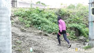 Dark Haired Babe Makes Huge Piss Puddle