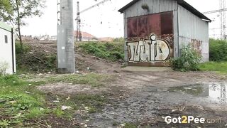 Dark Haired Babe Makes Huge Piss Puddle