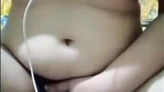 Hot Indian unsatisfied aunty masturbating solo at home