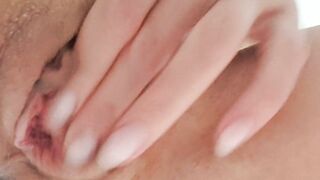 I caress the sweet clitoris with my fingers and a vibrator. sweet cum close up