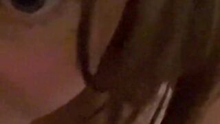 Close up handheld version of beautiful iPhone solo selfie dildoing in stockings