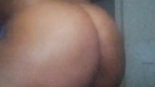 Horny ebony shaking her ass naked