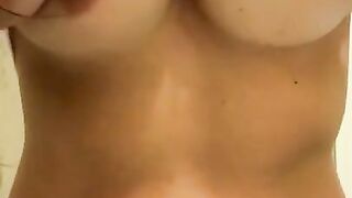 Playing with my nipples and squeezing my perky tits