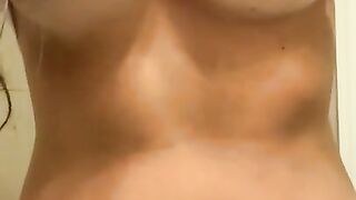 Playing with my nipples and squeezing my perky tits