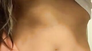 Playing with my nipples and squeezing my perky tits