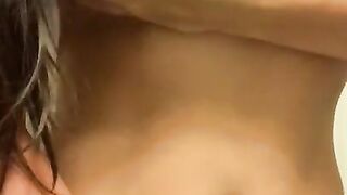 Playing with my nipples and squeezing my perky tits