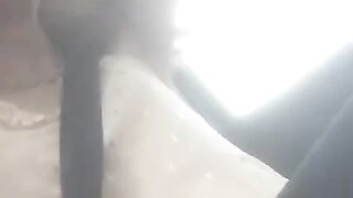 Beautiful  junkie doing a shot in the car