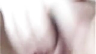 Blonde plays with herself