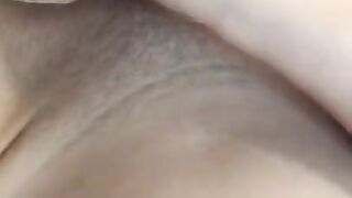 Close-up of pussy. Masturbating a pink pussy with a vibrator.