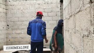 Big-titted Nigerian slut fucking in an uncompleted building.