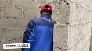 Big-titted Nigerian slut fucking in an uncompleted building.