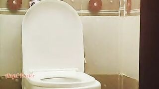I saw at a party how girl in a red dress pissing in the toilet.