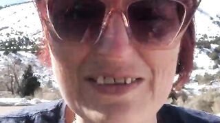Fun hippy mom is bursting for the loo on a road trip