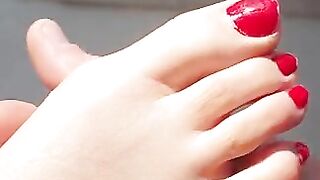 Sexy toes closeup in the sun