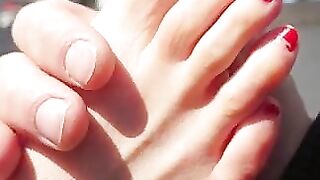 Sexy toes closeup in the sun