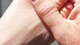 Sexy toes closeup in the sun