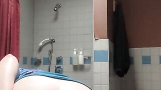 Slut spreads her holes in the bathroom