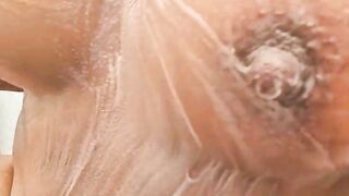 Ebony milf masturbates and reaches for a squirt and then showers outdoors