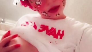 Cow girl acts lewd and plays with her tits and ass