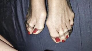 Big load on Red toes in black nylon