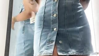A BLONDE IN THE DRESSING ROOM FILMING HERSELF WHILE NO ONE IS WATCHING