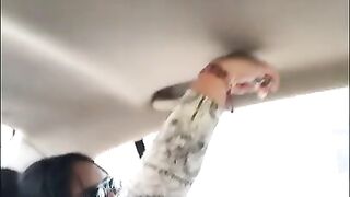 Hot girl with tattoos records herself very sensual in the car