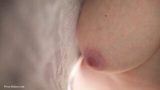Sexy tits of a petite girl under a T-shirt.