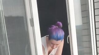 A neighbor girl washes windows without a bra and panties