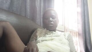 Fucking with carrot while sitted on sofa