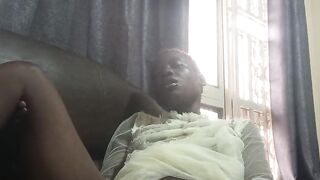 Fucking with carrot while sitted on sofa