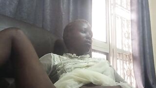 Fucking with carrot while sitted on sofa