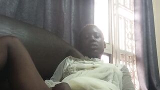 Fucking with carrot while sitted on sofa