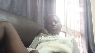 Fucking with carrot while sitted on sofa