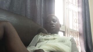 Fucking with carrot while sitted on sofa