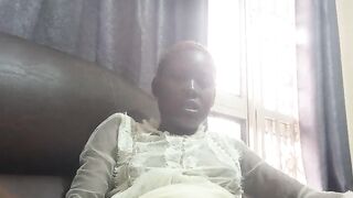 Fucking with carrot while sitted on sofa
