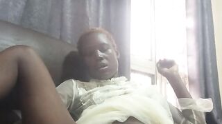 Fucking with carrot while sitted on sofa