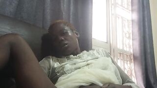 Fucking with carrot while sitted on sofa