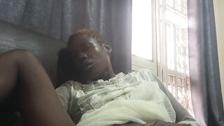 Fucking with carrot while sitted on sofa