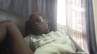 Fucking with carrot while sitted on sofa