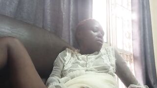 Fucking with carrot while sitted on sofa