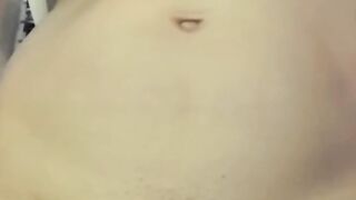 Teasing Nipple While Standing Naked at Work