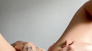 blonde plays with her pussy