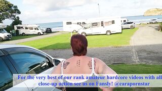 Trashy MILF slut pisses on the grass in front of other campers at the beach