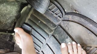 Pedal pumping barefooted in my big truck with white toe nails