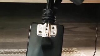 Giving a footjob in my strappy heels to a black cock on my fuck machine