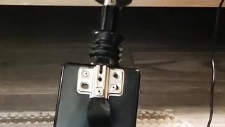 Giving a footjob in my strappy heels to a black cock on my fuck machine