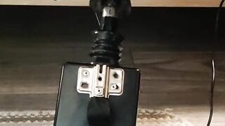 Giving a footjob in my strappy heels to a black cock on my fuck machine