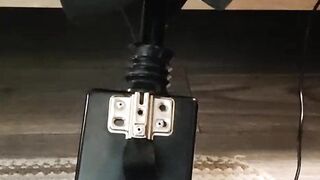 Giving a footjob in my strappy heels to a black cock on my fuck machine