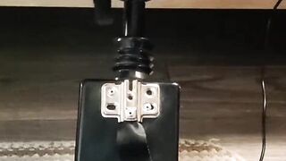 Giving a footjob in my strappy heels to a black cock on my fuck machine