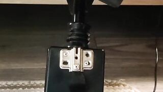 Giving a footjob in my strappy heels to a black cock on my fuck machine